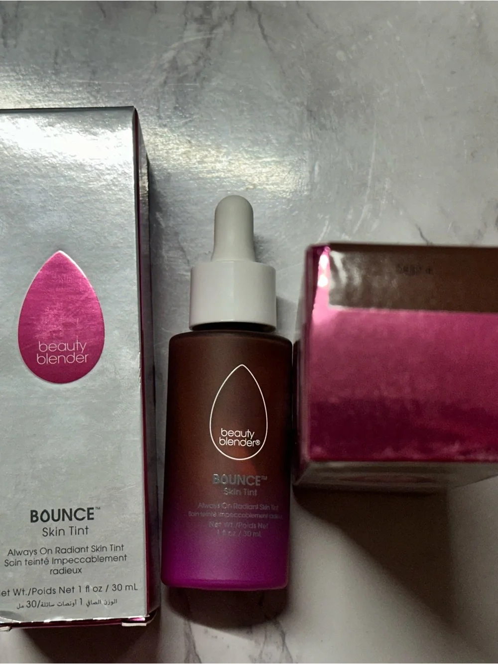 beautyblender Bounce Skin Tint Bottle in Pink and Brown